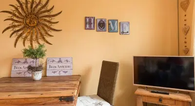 TV/Unterhaltungsangebot in der Unterkunft Altes Strandhus Kl.App Casa Ostsee