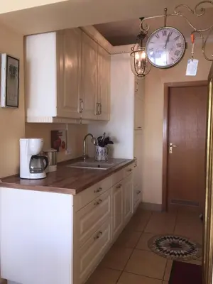 Küche/Küchenzeile in der Unterkunft Altes Strandhus Kl.App Casa Ostsee