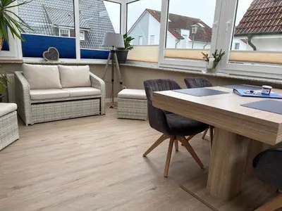 Ein Sitzbereich in der Unterkunft Ferienhaus Edda