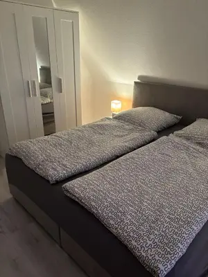 Ein Bett oder Betten in einem Zimmer der Unterkunft Ferienhaus Königsberg Haus 1