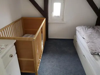 Ein Bett oder Betten in einem Zimmer der Unterkunft Haus Goldbutt - M. Frese