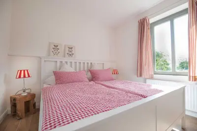 Ein Bett oder Betten in einem Zimmer der Unterkunft Ferienwohnung Spieß