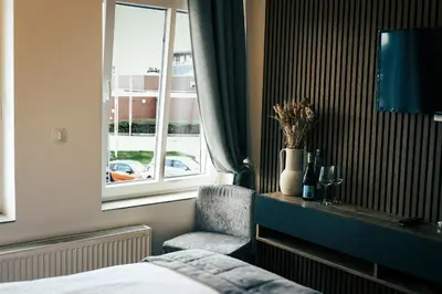 Ein Bett oder Betten in einem Zimmer der Unterkunft Ostsee Hotel Travemünde
