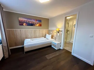 Ein Bett oder Betten in einem Zimmer der Unterkunft D&D Hotel by Wiggers