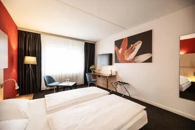 Ein Bett oder Betten in einem Zimmer der Unterkunft Good Morning + Bad Oldesloe