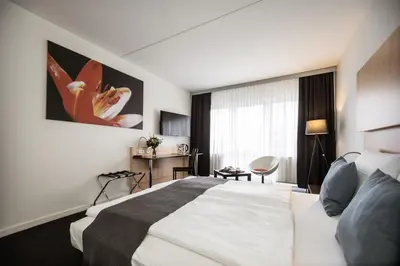 Ein Bett oder Betten in einem Zimmer der Unterkunft Good Morning + Bad Oldesloe