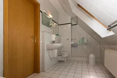 Ein Badezimmer in der Unterkunft Hotel Ideal