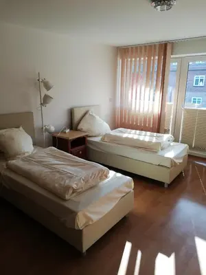 Ein Bett oder Betten in einem Zimmer der Unterkunft Hotel Ideal