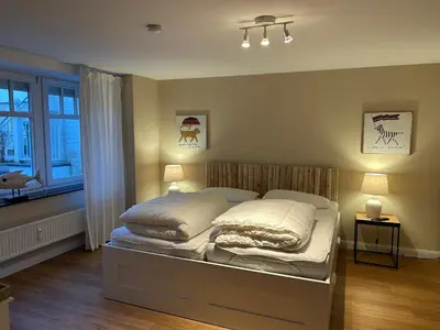 Ein Bett oder Betten in einem Zimmer der Unterkunft Seepferdchen