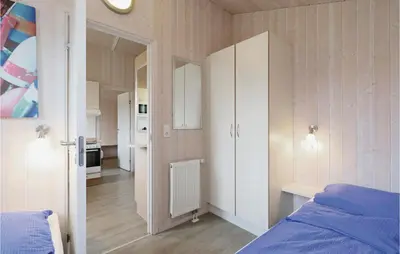 Ein Bett oder Betten in einem Zimmer der Unterkunft Frische Brise 8 - Dorf 2