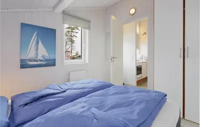 Ein Bett oder Betten in einem Zimmer der Unterkunft Frische Brise 7 - Dorf 2