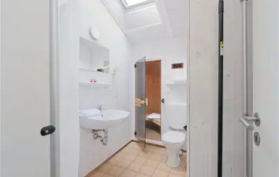 Ein Badezimmer in der Unterkunft Frische Brise 7 - Dorf 2