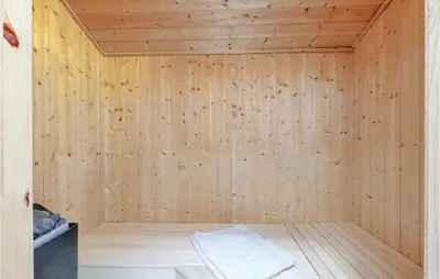 Ein Bett oder Betten in einem Zimmer der Unterkunft Abendrot 10 - Dorf 3
