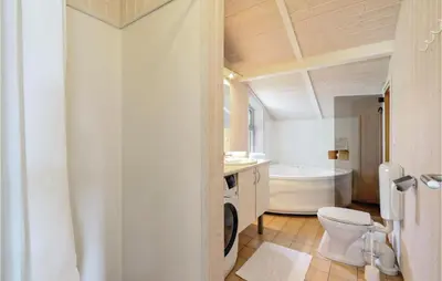 Ein Badezimmer in der Unterkunft Abendrot 12 - Dorf 3