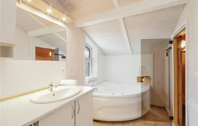 Ein Badezimmer in der Unterkunft Frische Brise 15 - Dorf 3