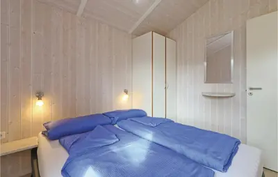 Ein Bett oder Betten in einem Zimmer der Unterkunft Freibeuterweg 1 - Dorf 6