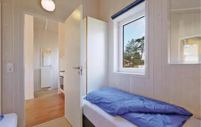 Ein Bett oder Betten in einem Zimmer der Unterkunft Freibeuterweg 3 - Dorf 6