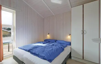 Ein Bett oder Betten in einem Zimmer der Unterkunft Freibeuterweg 3 - Dorf 6