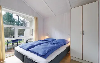 Ein Bett oder Betten in einem Zimmer der Unterkunft Schmugglerstieg 2 - Dorf 6