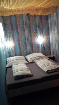 Ein Bett oder Betten in einem Zimmer der Unterkunft Appartment Holiday