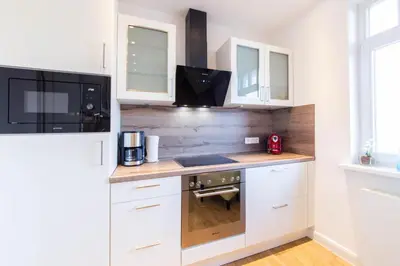 Küche/Küchenzeile in der Unterkunft Ferienwohnung Villa Susewind 2
