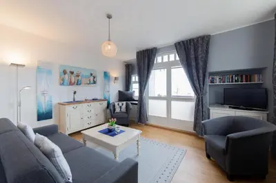 Ein Sitzbereich in der Unterkunft Ferienwohnung Villa Susewind 1