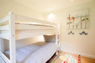 Ein Bett oder Betten in einem Zimmer der Unterkunft Ferienwohnung Onkel Toms Hütte
