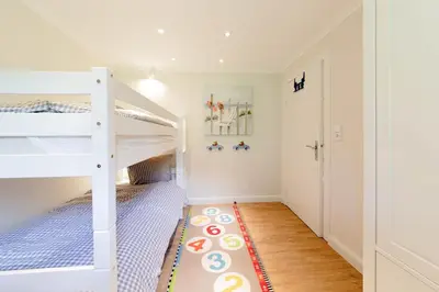 Ein Bett oder Betten in einem Zimmer der Unterkunft Ferienwohnung Onkel Toms Hütte