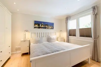 Ein Bett oder Betten in einem Zimmer der Unterkunft Ferienwohnung Onkel Toms Hütte