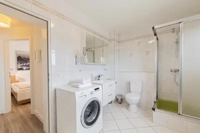 Ein Badezimmer in der Unterkunft Ferienwohnung 2 Haus Meeresrauschen