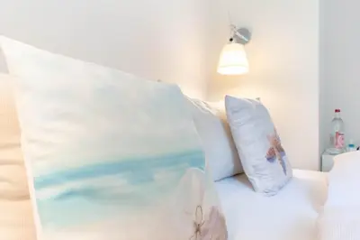 Ein Bett oder Betten in einem Zimmer der Unterkunft Ferienwohnung Frische Brise
