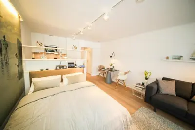 Ein Bett oder Betten in einem Zimmer der Unterkunft Ferienwohnung Am Strand