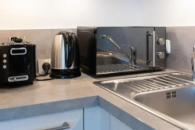 Küche/Küchenzeile in der Unterkunft Ferienwohnung Bodo´s Strandkorb