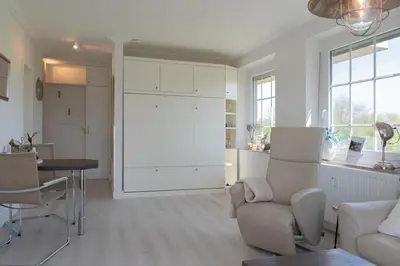 Ein Sitzbereich in der Unterkunft Ferienwohnung Ankommen