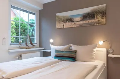 Ein Bett oder Betten in einem Zimmer der Unterkunft Ferienwohnung Ausspann