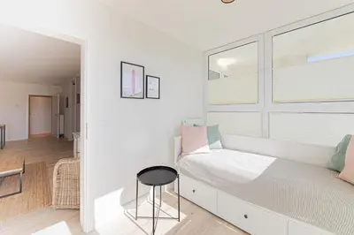 Ein Bett oder Betten in einem Zimmer der Unterkunft Ferienwohnung Seesand No.08