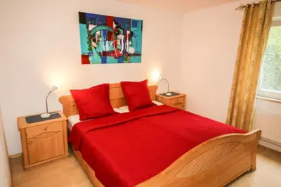 Ein Bett oder Betten in einem Zimmer der Unterkunft Ferienhaus Fischerhus Hans
