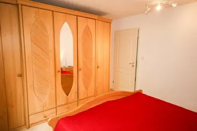 Ein Bett oder Betten in einem Zimmer der Unterkunft Ferienhaus Fischerhus Hans