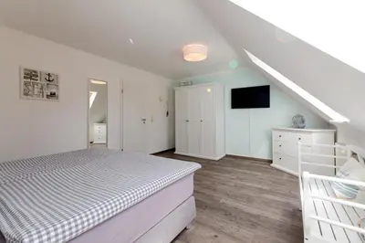 Ein Bett oder Betten in einem Zimmer der Unterkunft Ferienhaus Isabel