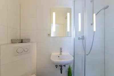 Ein Badezimmer in der Unterkunft Ferienwohnung App.11 Haus Duckdalben