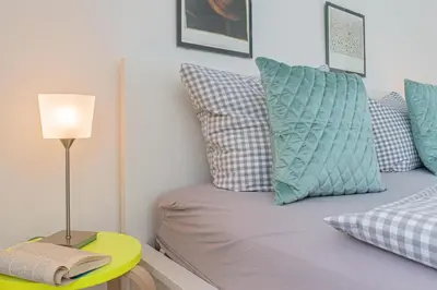 Ein Bett oder Betten in einem Zimmer der Unterkunft Ferienwohnung Der Olle Hansen