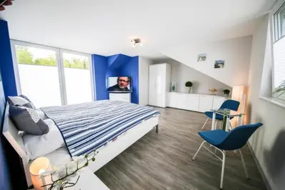 Ein Bett oder Betten in einem Zimmer der Unterkunft Ferienwohnung Glücksgefühl