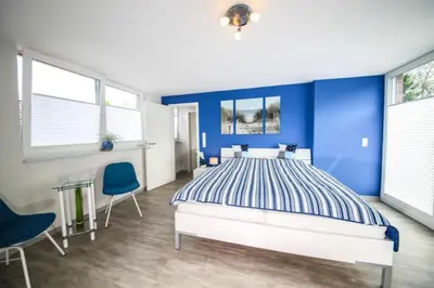 Ein Bett oder Betten in einem Zimmer der Unterkunft Ferienwohnung Glücksgefühl