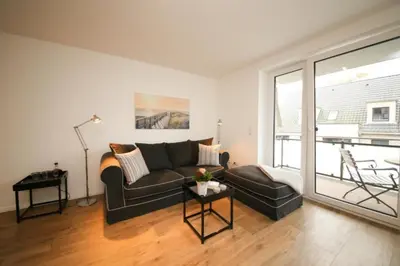 Ein Sitzbereich in der Unterkunft Ferienwohnung Küstentraum