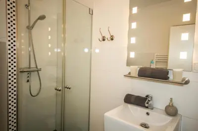 Ein Badezimmer in der Unterkunft Ferienwohnung Haus Baltic App. 09