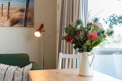 Ein Sitzbereich in der Unterkunft Ferienwohnung Kajüte