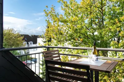 Ein Balkon oder eine Terrasse in der Unterkunft Ferienwohnung Maisonette Strandallee
