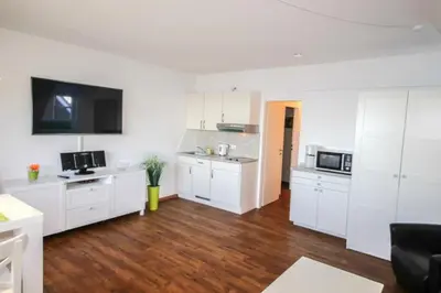 Küche/Küchenzeile in der Unterkunft Ferienwohnung Kutter Haus Duckdalben