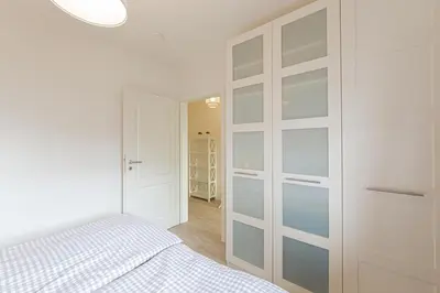 Ein Bett oder Betten in einem Zimmer der Unterkunft Ferienwohnung Muschel 1
