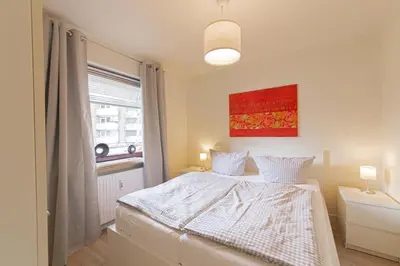 Ein Bett oder Betten in einem Zimmer der Unterkunft Ferienwohnung Muschel 1